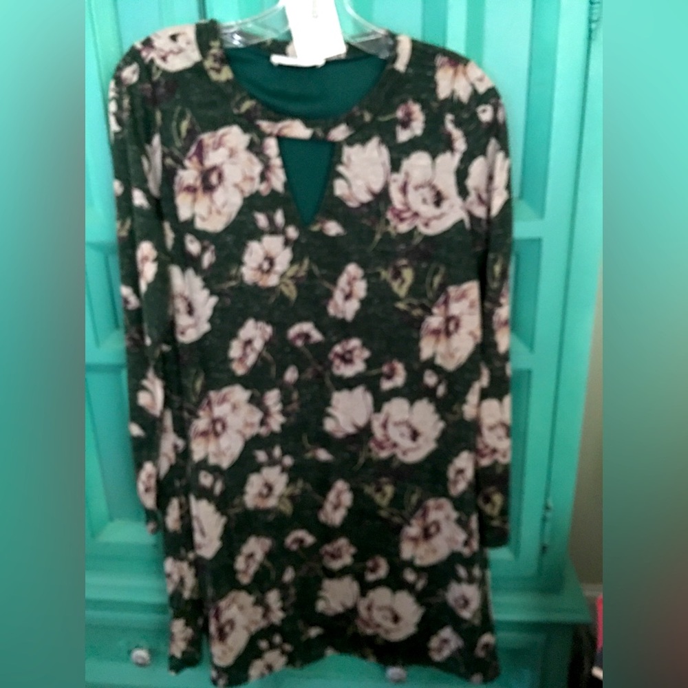 Short loose fitting dress. Cute with boots or sandals.